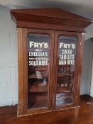 A Victorian and later mahogany bookcase - Fry's chocolate