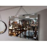 An early twentieth century frameless mirror