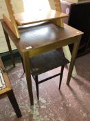 A mid century teak table and a small coffee table.