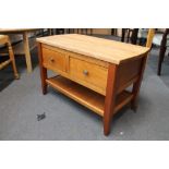 A light oak two drawer low table CONDITION REPORT: 78cm wide by 42cm deep by 50cm