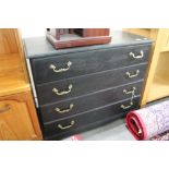 An antique style four drawer chest