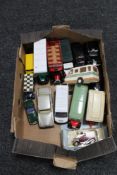 A box of die cast vehicles,