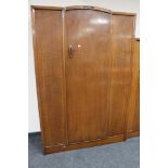 An early twentieth century oak wardrobe