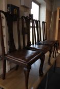 A set of four Edwardian dining chairs