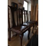 A set of four Edwardian dining chairs