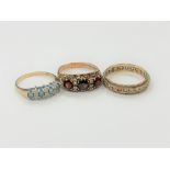 Three 9ct gold gem set dress rings CONDITION REPORT: 7.6g gross.