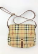 A Burberry Check Leather handbag, with brown shoulder strap and press-stud flap,