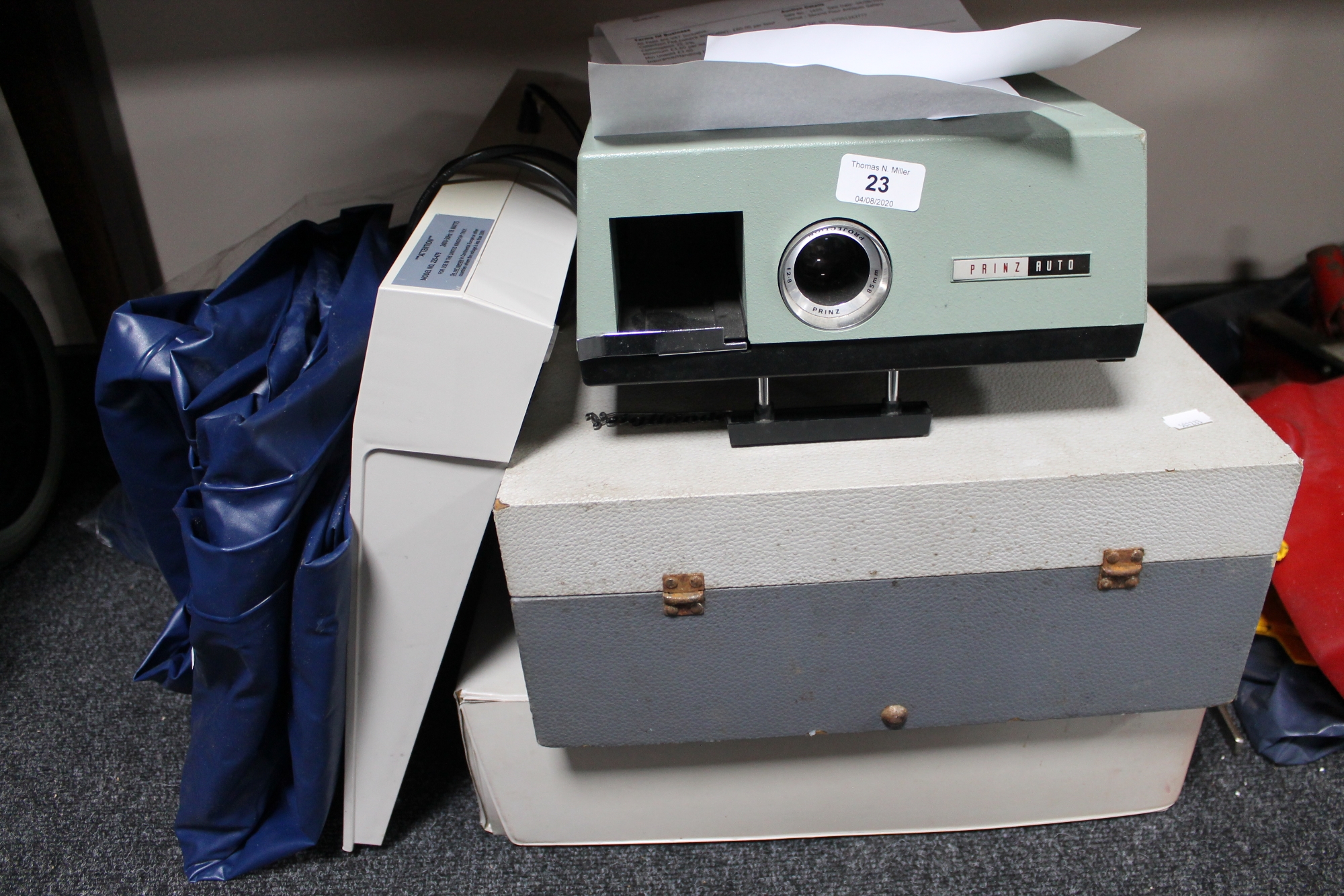 * Withdrawn *A vintage 35mm projector, light box,