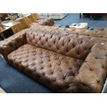 A brown studded leather Chesterfield style settee CONDITION REPORT: This is a pair