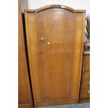 An early twentieth century oak single door cabinet