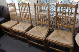 Four country style rail backed kitchen chairs