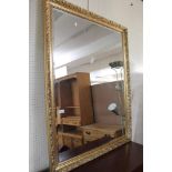 A gilt framed bevelled mirror