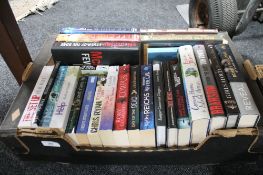 A box of paperback books