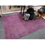 A contemporary purple rug