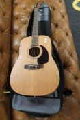 A Canadian acoustic guitar in gig bag