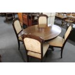 An antique oval occasional table and four 19th century mahogany dining chairs.