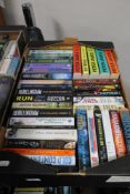 A box of paperback books