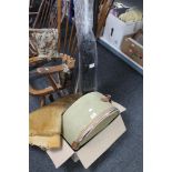 A canvas hat box, fur skin, fishing net,