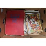 A box containing war magazines,