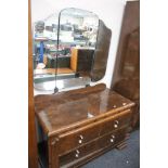 An early twentieth century figured walnut wardrobe and dressing table