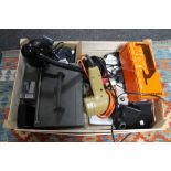 A box of Black & Decker tool, portable radio, table lamp,