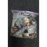 A bag of costume jewellery