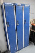 Three metal storage cabinets