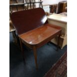 A Victorian inlaid mahogany tea table