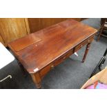 A Victorian mahogany two drawer side table