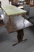 An onyx effect coffee table on metal base and an oak refectory table