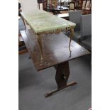 An onyx effect coffee table on metal base and an oak refectory table