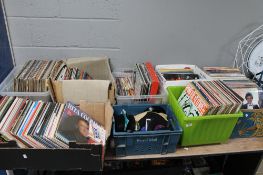 A large quantity of vinyl records and singles (Eight boxes)