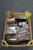 A crate of die cast racing cars,