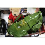 A tray of Harrods bag, teddy bear, hip flask,