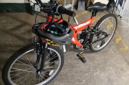 A child's full suspension Trax mountain bike