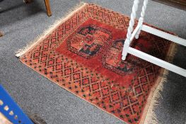 A fringed eastern rug