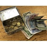 A tin of bank notes including USA dollars, Bank of Israel, Portugal etc,