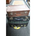 Three vintage suitcases