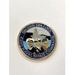 A Royal Navy Challenge coin,