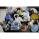 A tray of china ornaments, Doulton figures,