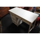 A white contemporary four drawer desk