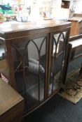 An Edwardian mahogany glazed display cabinet