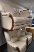 A three piece leather lounge suite with footstool