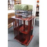 An Edwardian footstool together with a mahogany revolving book stand