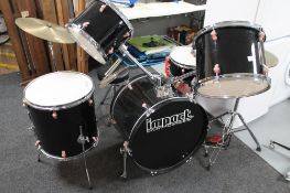 An Impact drum company drum kit and Vic Firth drum mutes