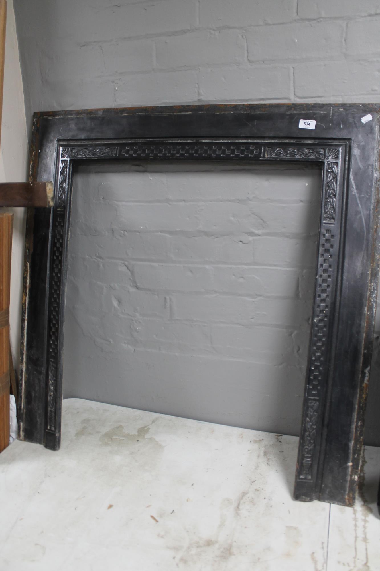 A cast Edwardian fire surround CONDITION REPORT: 96.5cm by 96.5cm overall.