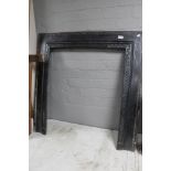 A cast Edwardian fire surround CONDITION REPORT: 96.5cm by 96.5cm overall.