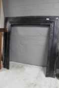 A cast Edwardian fire surround CONDITION REPORT: 96.5cm by 96.5cm overall.