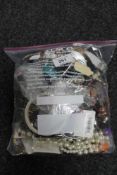 A bag of costume jewellery