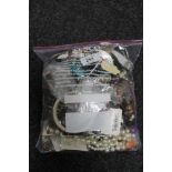 A bag of costume jewellery